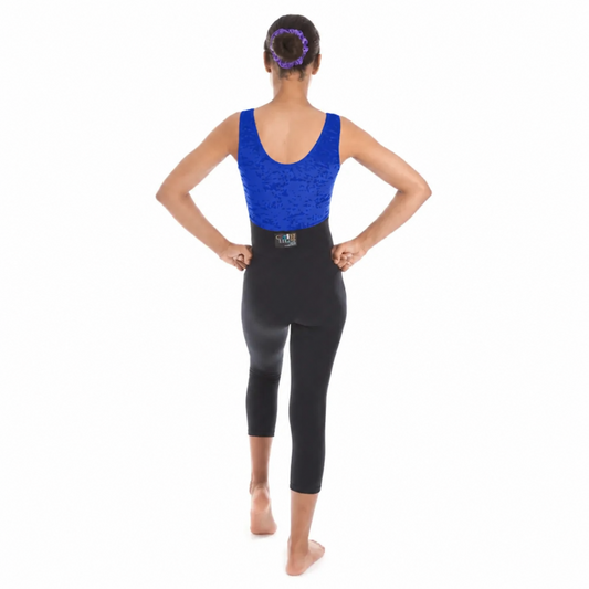 Person wearing a blue tank top and black leggings on a white background