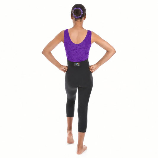 A woman shown from the back wearing a purple lace-trimmed sleeveless top and black high-waisted capri leggings, standing against a plain white background.